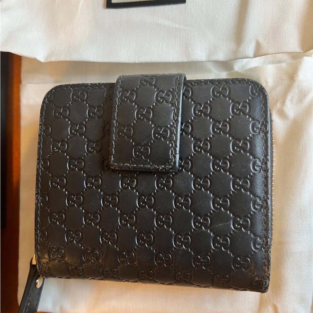 Gucci embossed black wallet